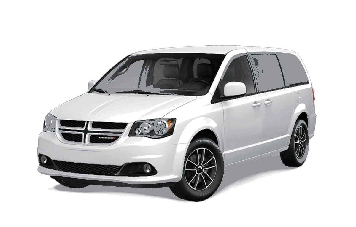 A white minivan used for small commercial deliveries, shown from the front three-quarter view.